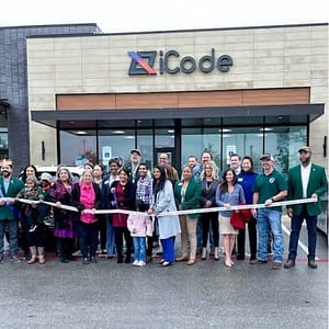 The team at a new iCode Campus gets ready to cut their ribbon