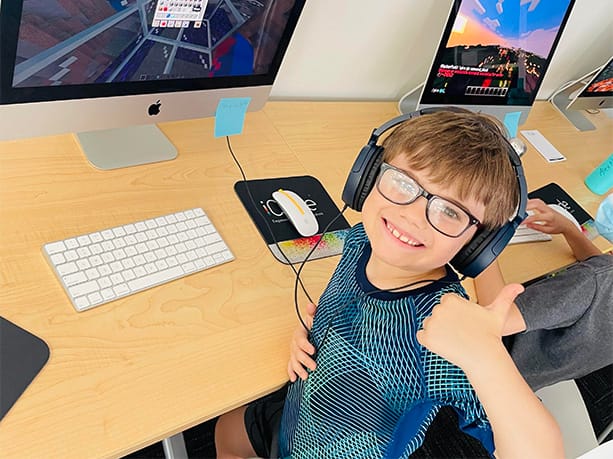 A child has fun in a Minecraft themed Path Class