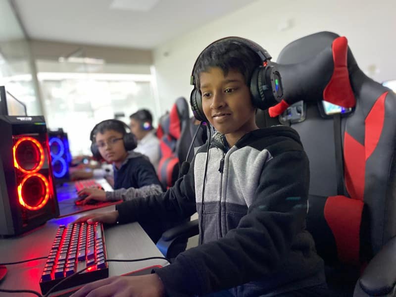A child competes in an iCode sponsored gaming event